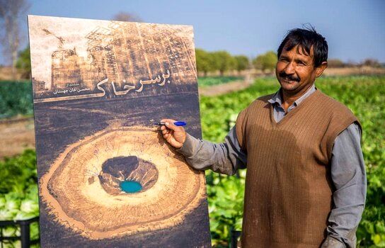 Farmers sign poster for doc “On Soil” to warn about soil erosion